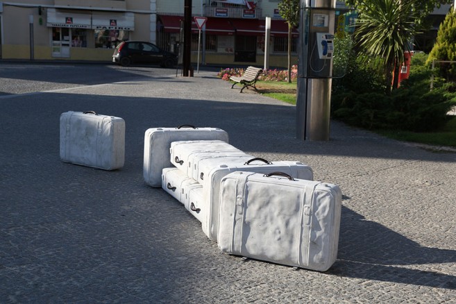 In tran-sit, 2002-2010 / Solid concrete cast and bronze / Life size suitcases